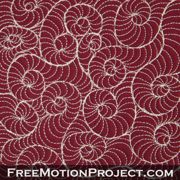 free motion quilting design fossil snail