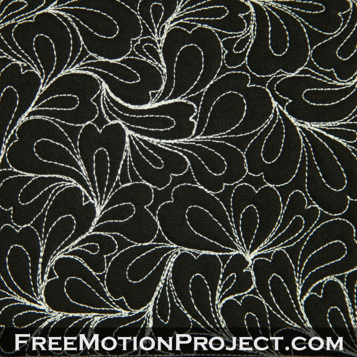 free motion quilting design bleeding hearts