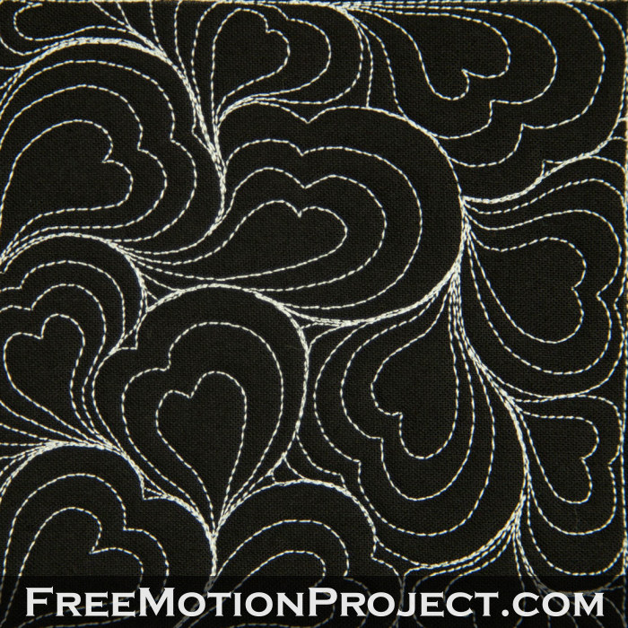 free motion quilting design heart paisley