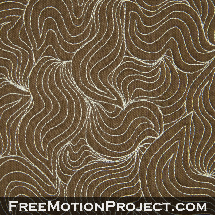 free motion quilting design snake paisley