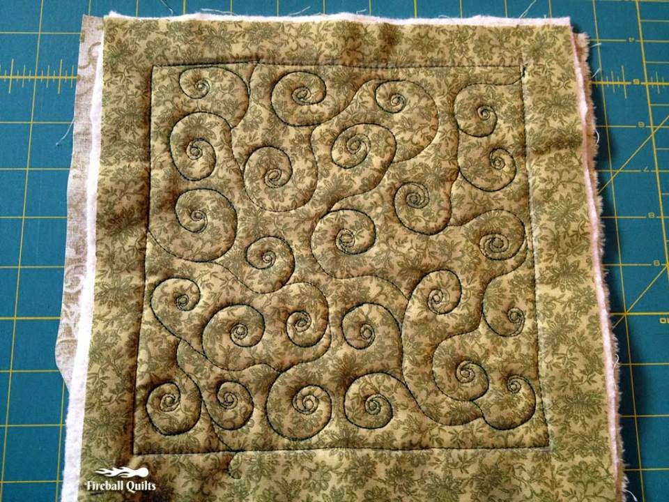 http://chunkyboy.com/fireballquilts/2015/02/perched-owl-and-daisies/