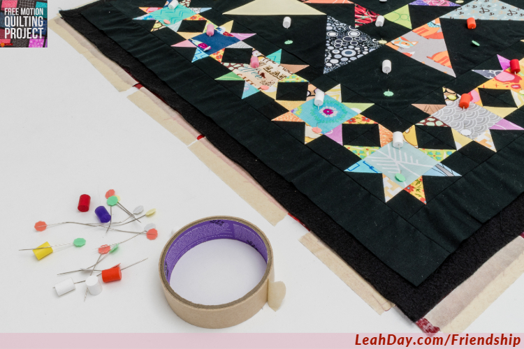 Learn how to baste your quilt blocks for quilting-as-you-go