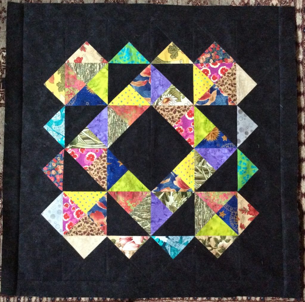 How to quilt a Scrappy Star block