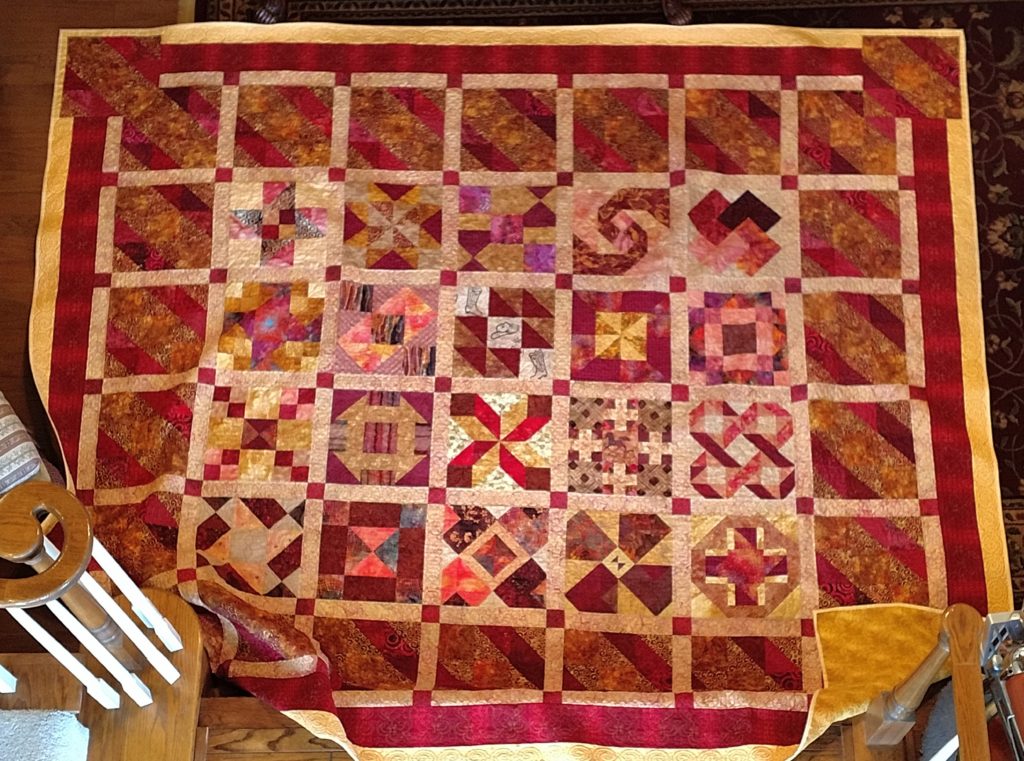 Rubies and Gold Beth Collins Quilt